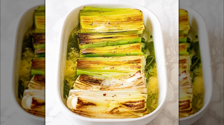 Browned braised leeks in roasting pan