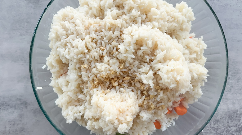 bowl filled with rice and carrots