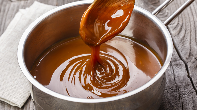 A pot of caramel sauce