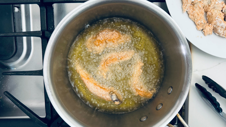 frying mushrooms in saucepan