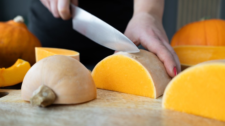 cutting butternut squash into pieces