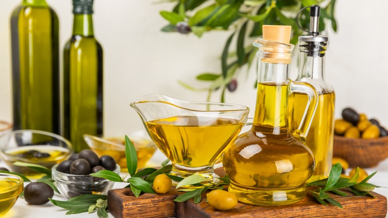 bottles of olive oil and olives