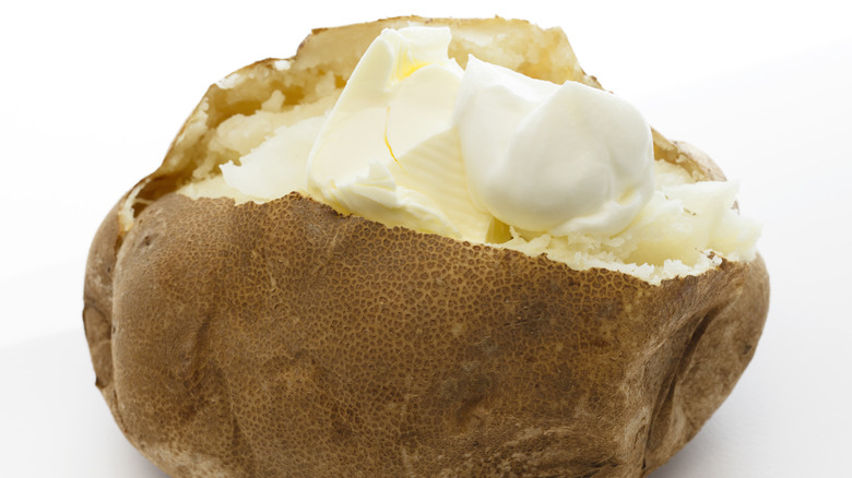 Baked potato isolated on white background