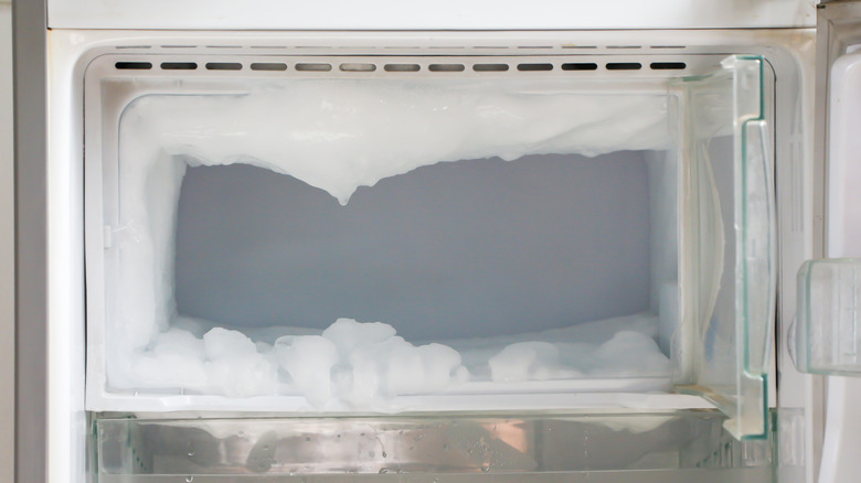 freezer frozen over with ice