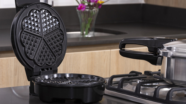 Waffle iron on kitchen counter