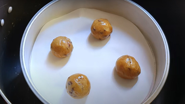 Cookie dough balls in pan
