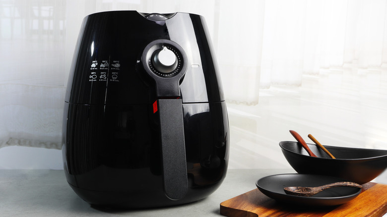 black air fryer on counter