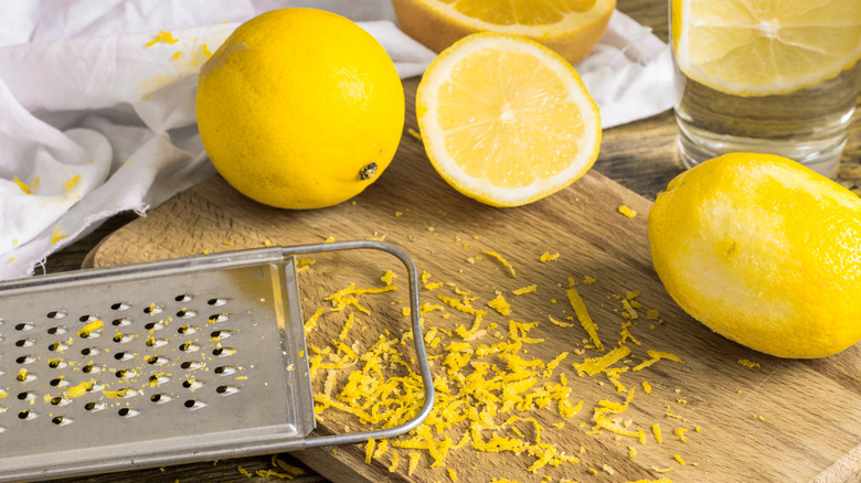 lemon zest with lemons and lemon zester