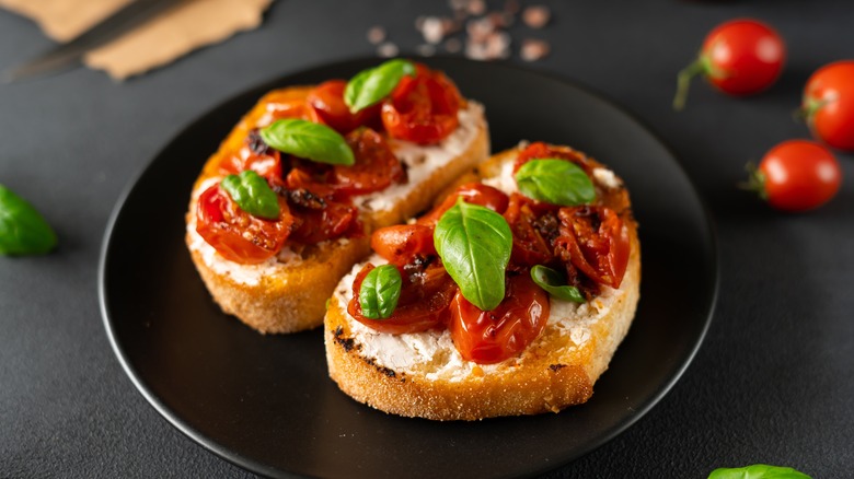 cherry tomatoes on bruschetta