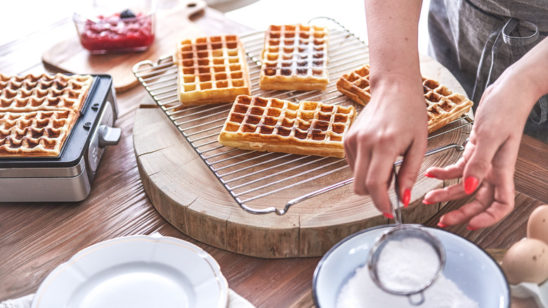 Woman making waffles at home