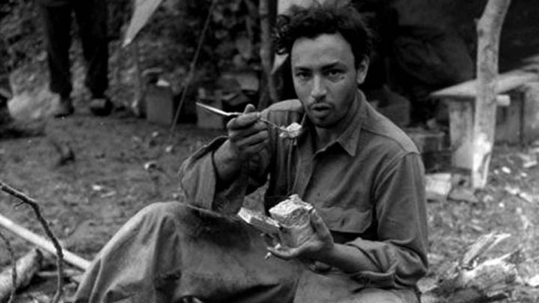 Soldier eating canned corned beef