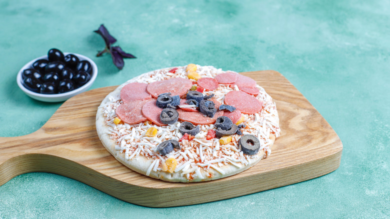 frozen pizza with olives dish