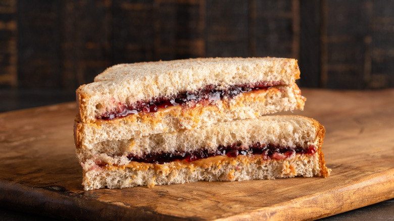 A halved peanut butter and jelly sandwich.