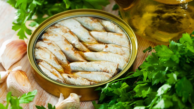 Round opened can of sardines