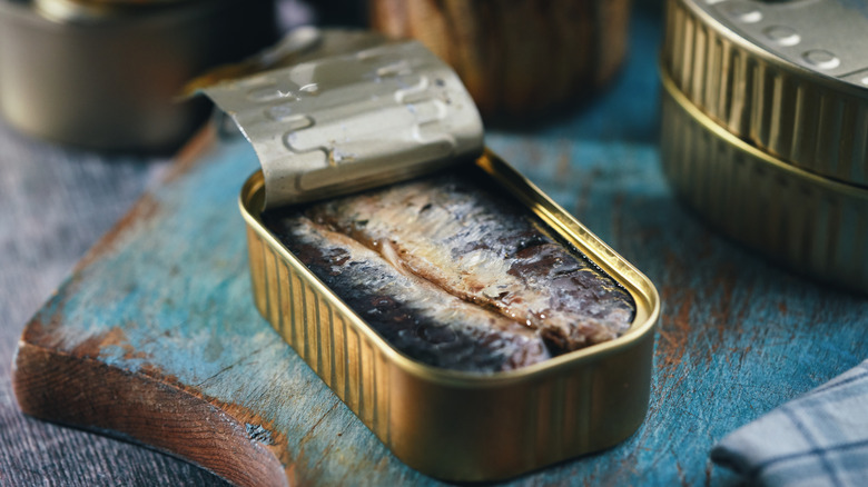 open canned sardines on board