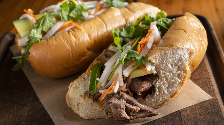Two bánh mì sandwiches on plate