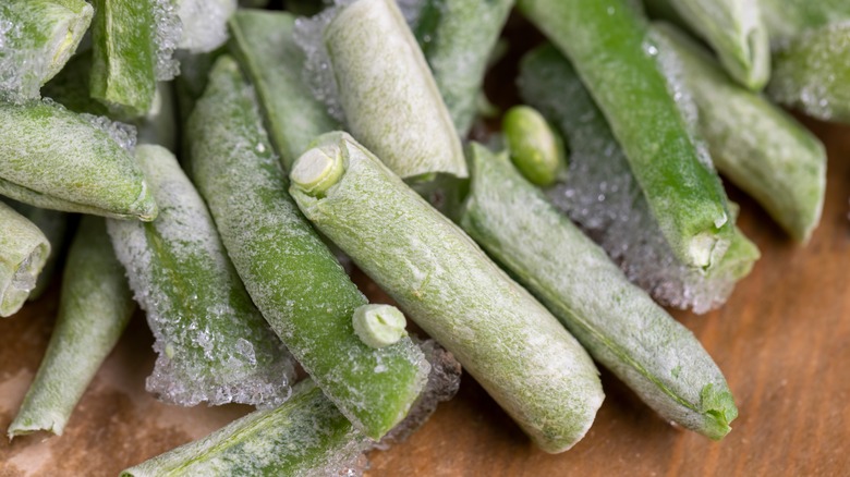 frozen green beans on wood