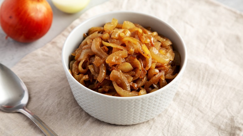 Bowl of caramelized onions on linen towel