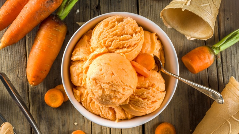 Carrot ice cream in bowl 