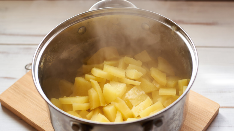 cooked potatoes in pan