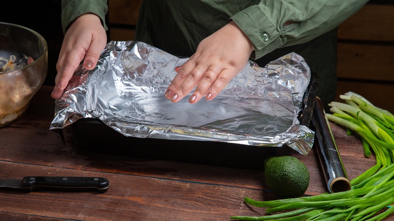 Lining a baking dish with foil