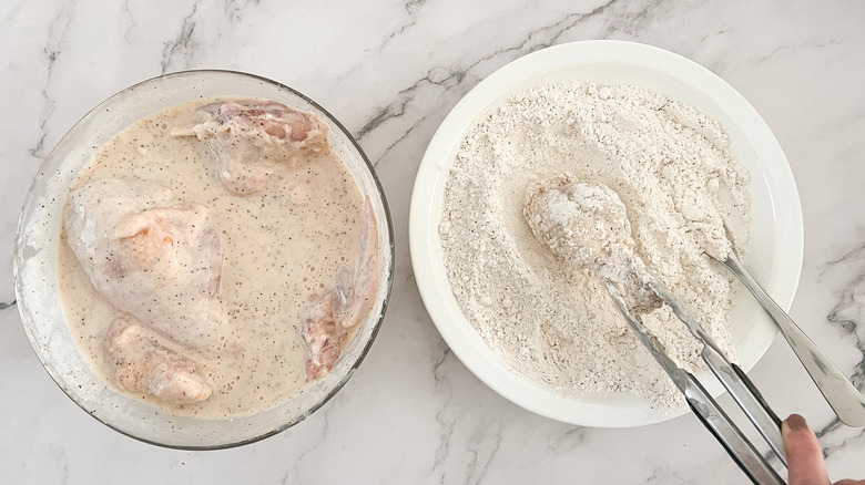 chicken in marinade and flour 