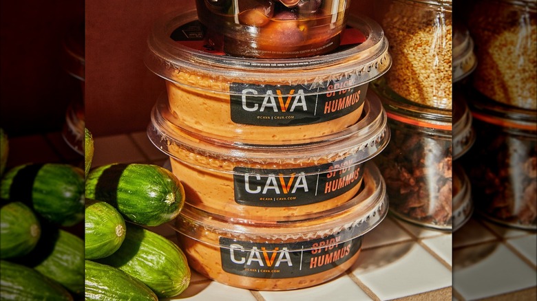 Containers of CAVA Spicy Hummus