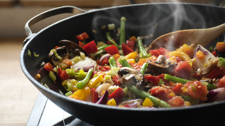 making stir fry in pan