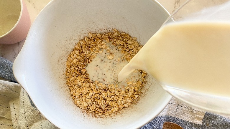 oats and milk in bowl 