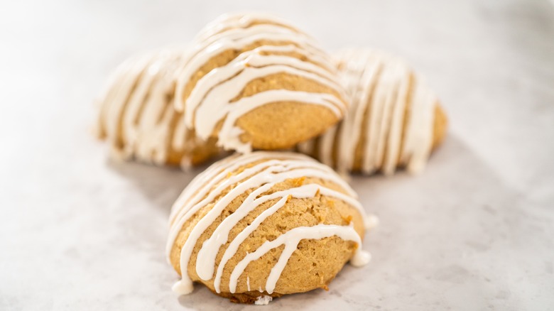 White fudge drizzled on cookies