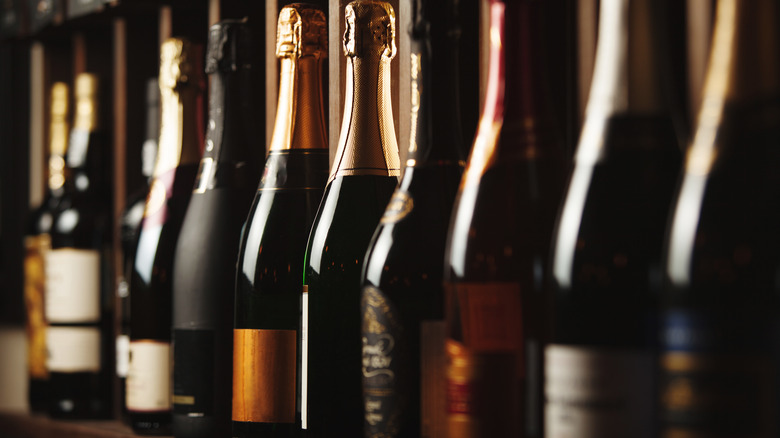 bottles of sparkling wine on shelf