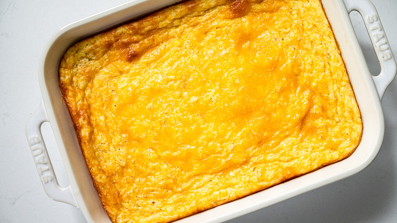 cheesy corn casserole in dish 