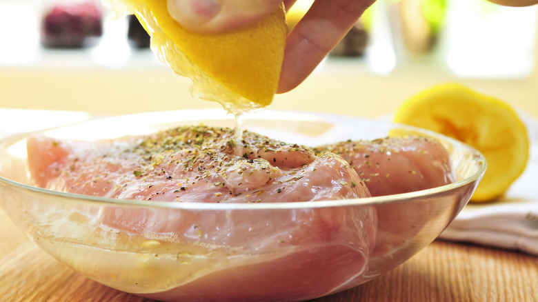 Raw chicken in lemon brine