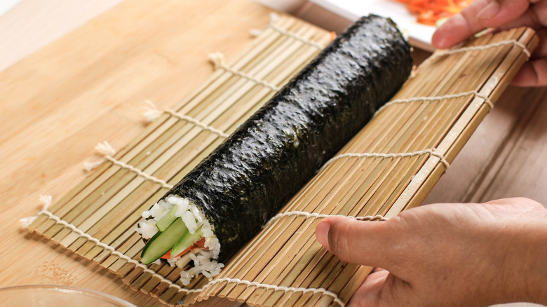 kimbap rolled with bamboo sushi mat