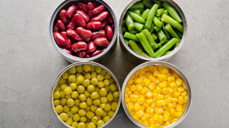 Open cans of vegetables