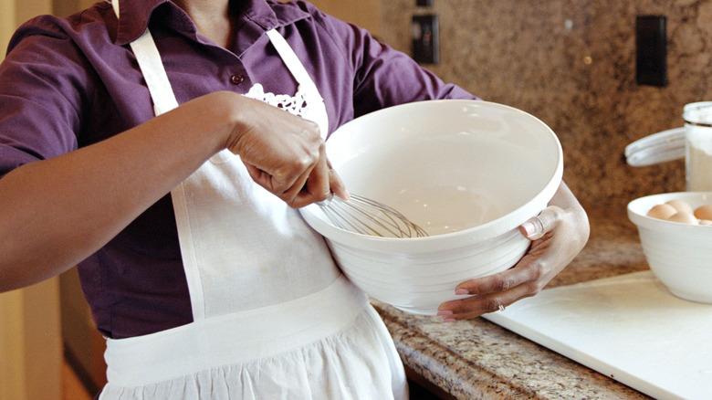 Woman stirring ingredients in bowl