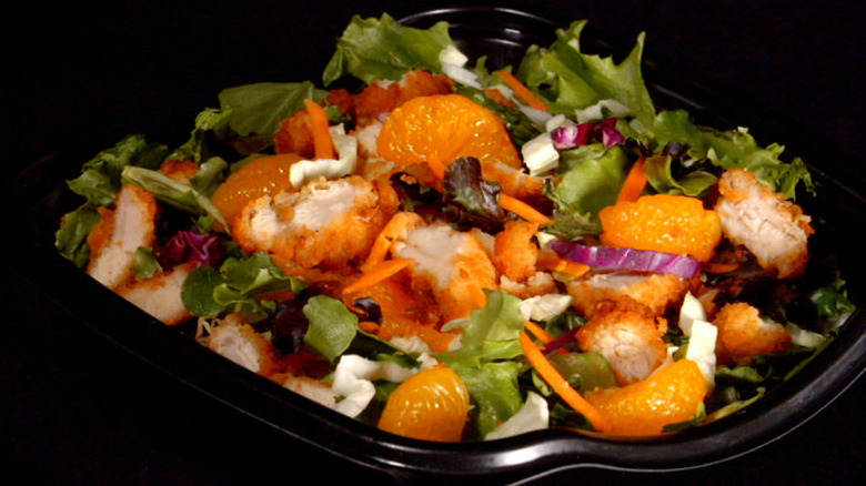salad with oranges, cabbage, and chicken