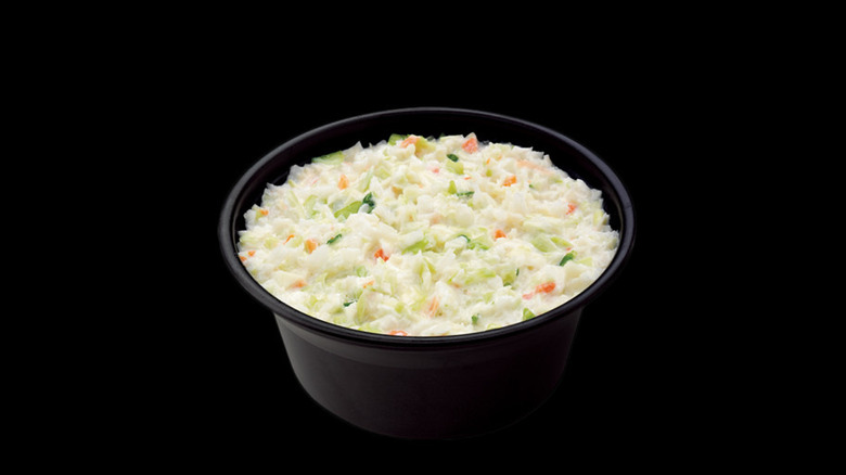 cole slaw in a black cup