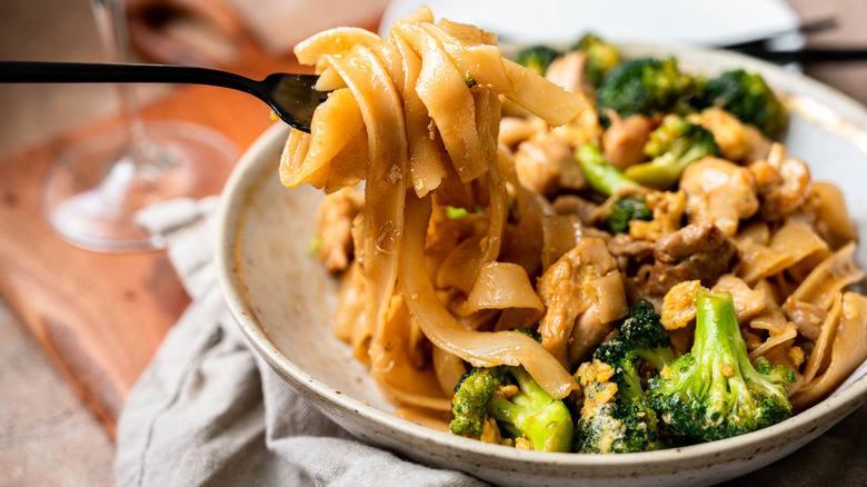 noodles and broccoli in bowl