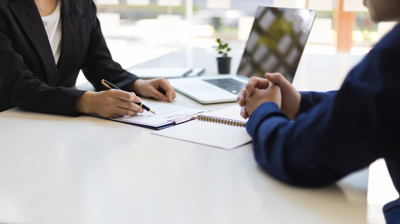 Two people at a business meeting