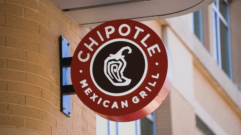 Chipotle restaurant sign on building