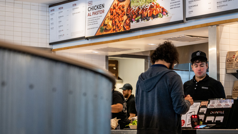 Chipotle worker and customer