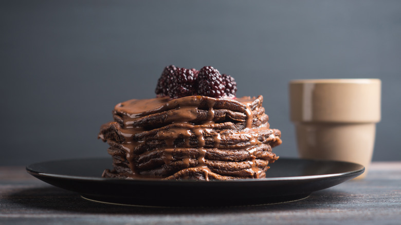 Chocolate pancakes with berries