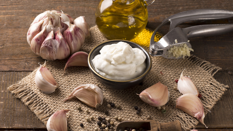 garlic and small bowl of mayonnaise 