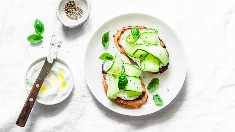 cream cheese toasts with pickled cucumbers