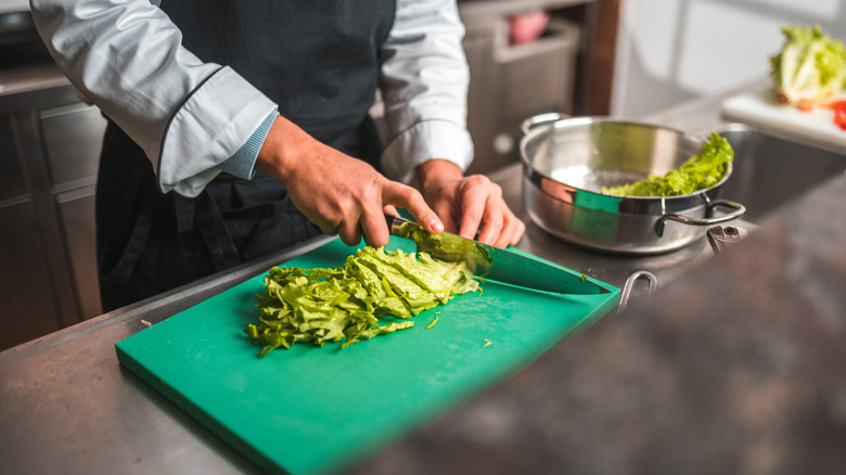 chopping lettuce