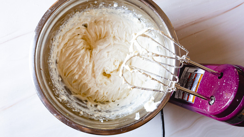 whipped cheesecake filling in bowl