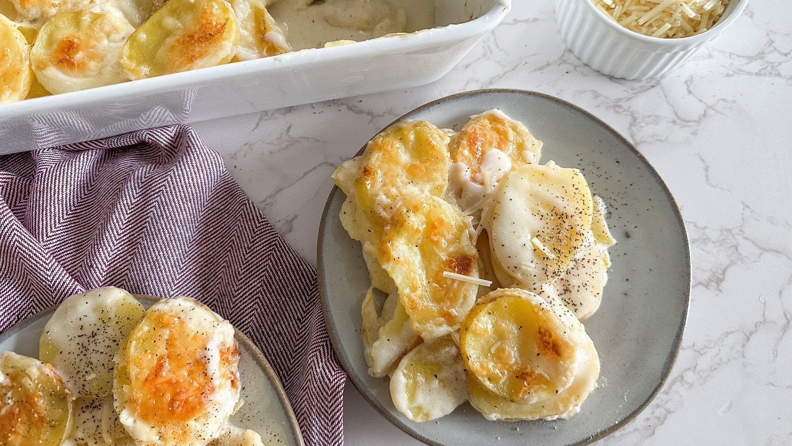 https://www.thedailymeal.com/img/gallery/classic-creamy-scalloped-potatoes-recipe/l-intro-1670524783.jpg