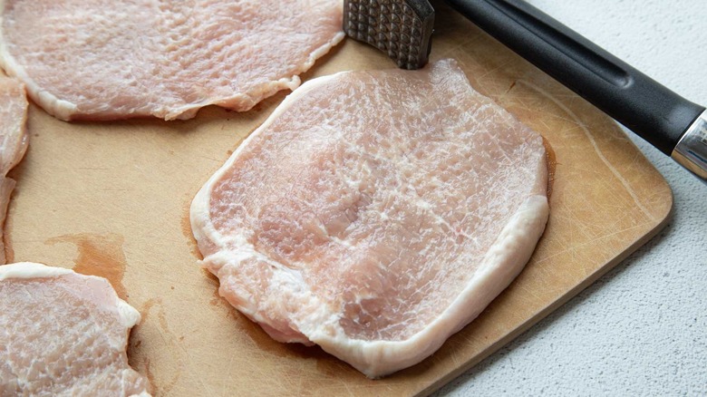 pork chops with a meat mallet