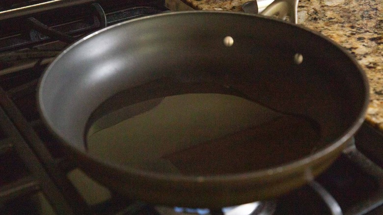 nonstick pan with oil on the stove